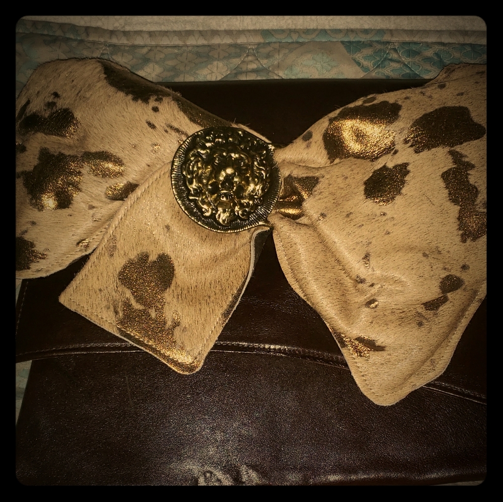 Designer handbags n clutch.. 5bags for $65.00